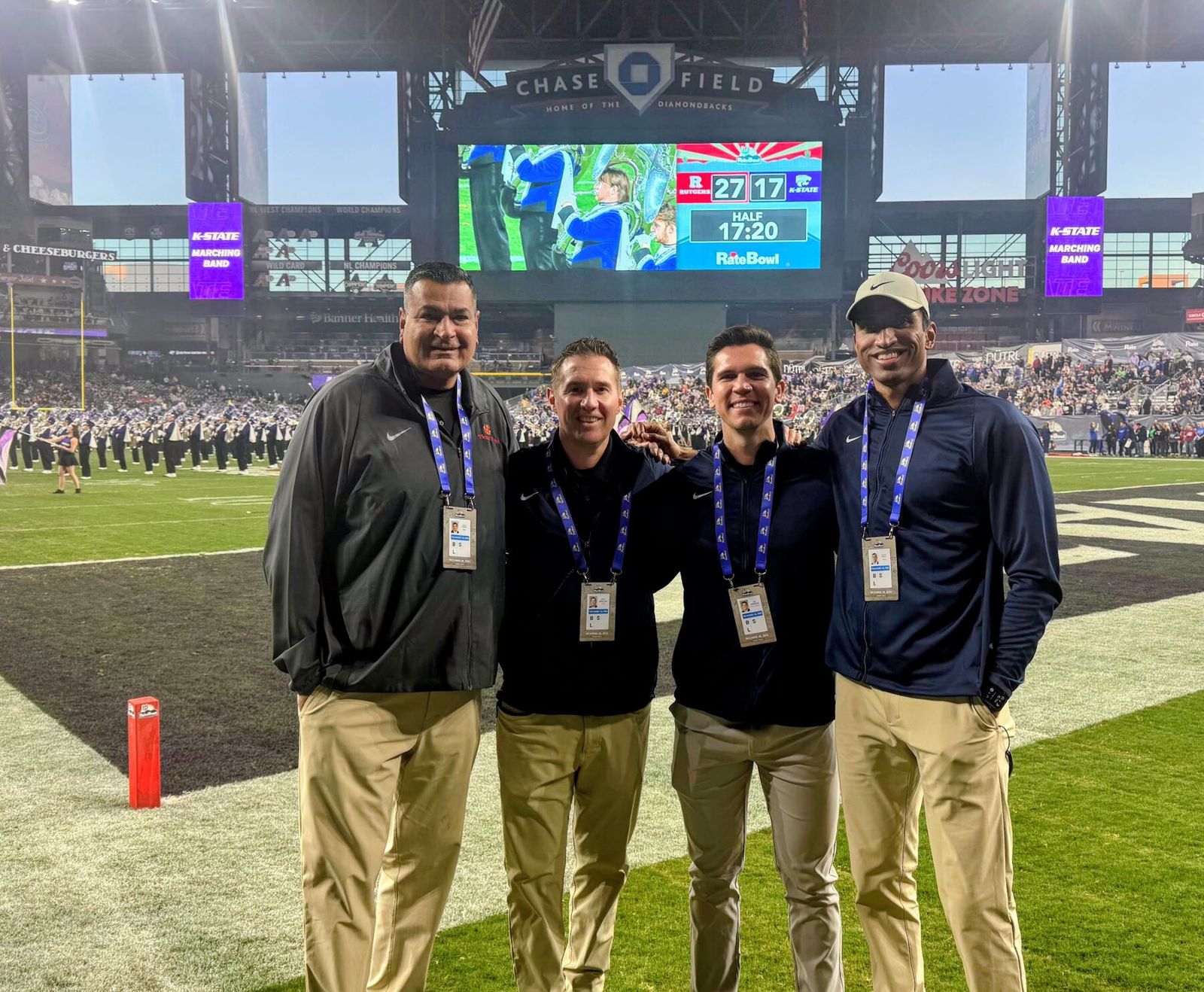 Dr. Tummala with the sports medicine team on the sideline at a college bowl game